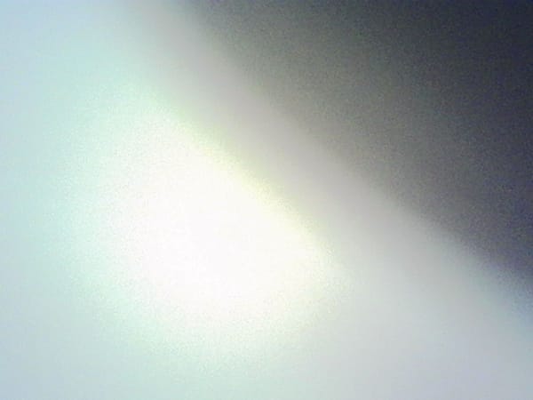 A grainy, indistinct picture of a bright light